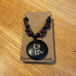 Handcrafted Black Pendant Necklace with Brown Beads